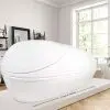 Float tank installed in a bright room