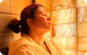 Woman relaxing in an Himalayan salt room
