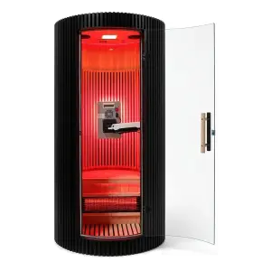 SpiritualQuest Rocket infrared sauna pod with glass door open, red light therapy arm, wood bench, and glowing interior